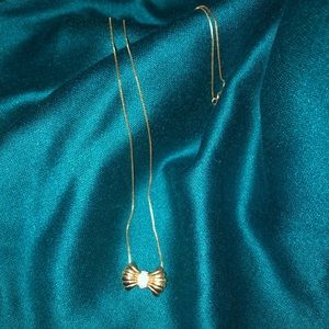 14k gold bow necklace, opal center. 18inches